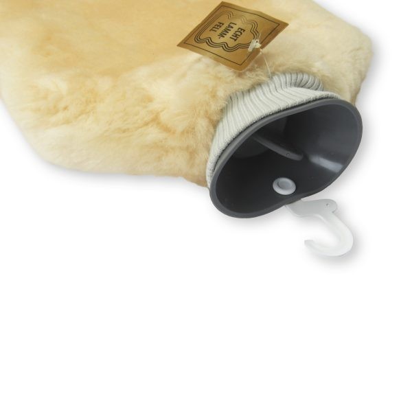Lammfell-Betteinlage für das Kinderbett, Lammfell-Wärmflasche | Heitmann  Felle - Großhandel für Felle und Fellprodukte
